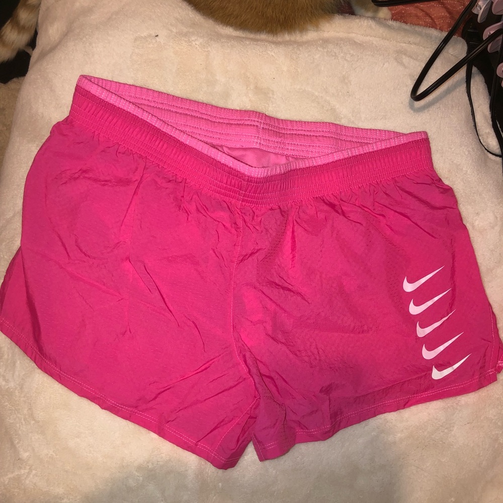 Pink Nike shorts